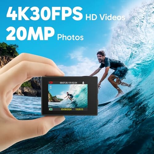 Person surfing with an action camera displaying video and photo specs.