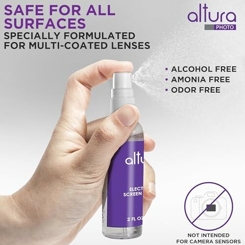 Hand holding Altura Photo screen cleaner spray bottle.