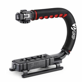 Camera stabilizer grip with ergonomic handle and mounting bracket.