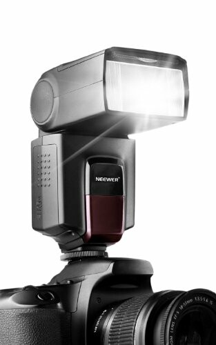 Camera with a mounted external flash.