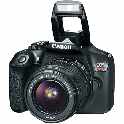 Canon EOS Rebel T7 DSLR camera with lens and flash