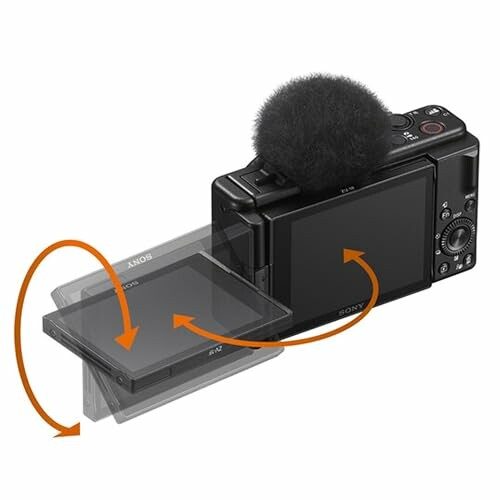 Compact camera with a microphone and flip-out screen.