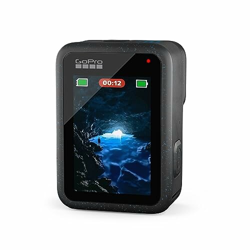 GoPro HERO12 Black with screen displaying a cave scene