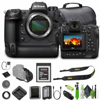 Nikon camera with accessories including lenses, memory card, and straps