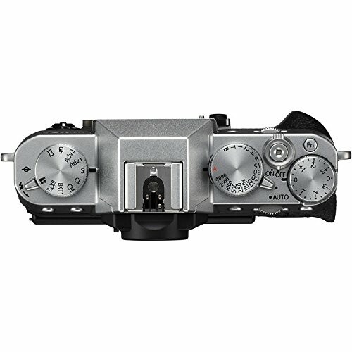 Top view of a digital camera showing control dials and buttons.