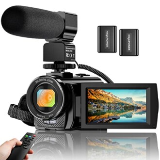 Video camera with microphone, remote, and batteries.