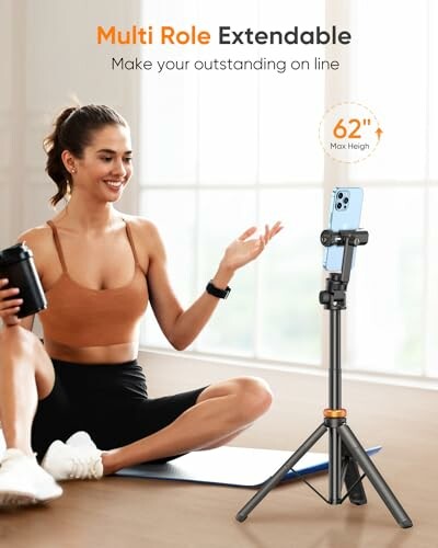 Woman sitting with a smartphone on a tripod.